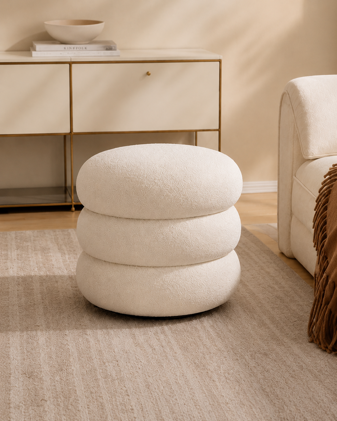 Tiered round stool in white, styled in a room
