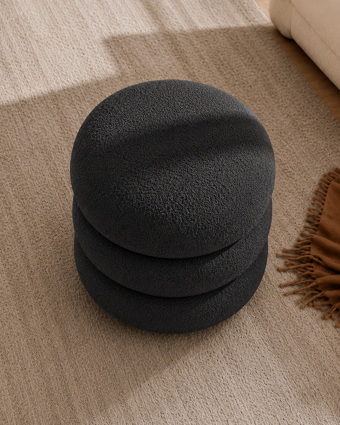 Tiered round stool in charcoal, side view